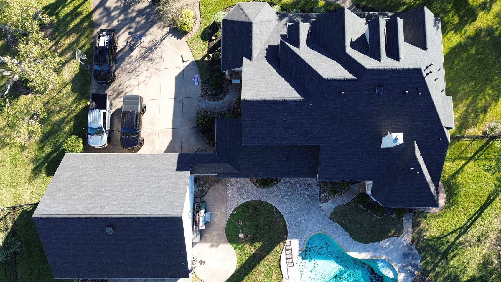 Owens Corning Onyx Black roof with solar attic fans